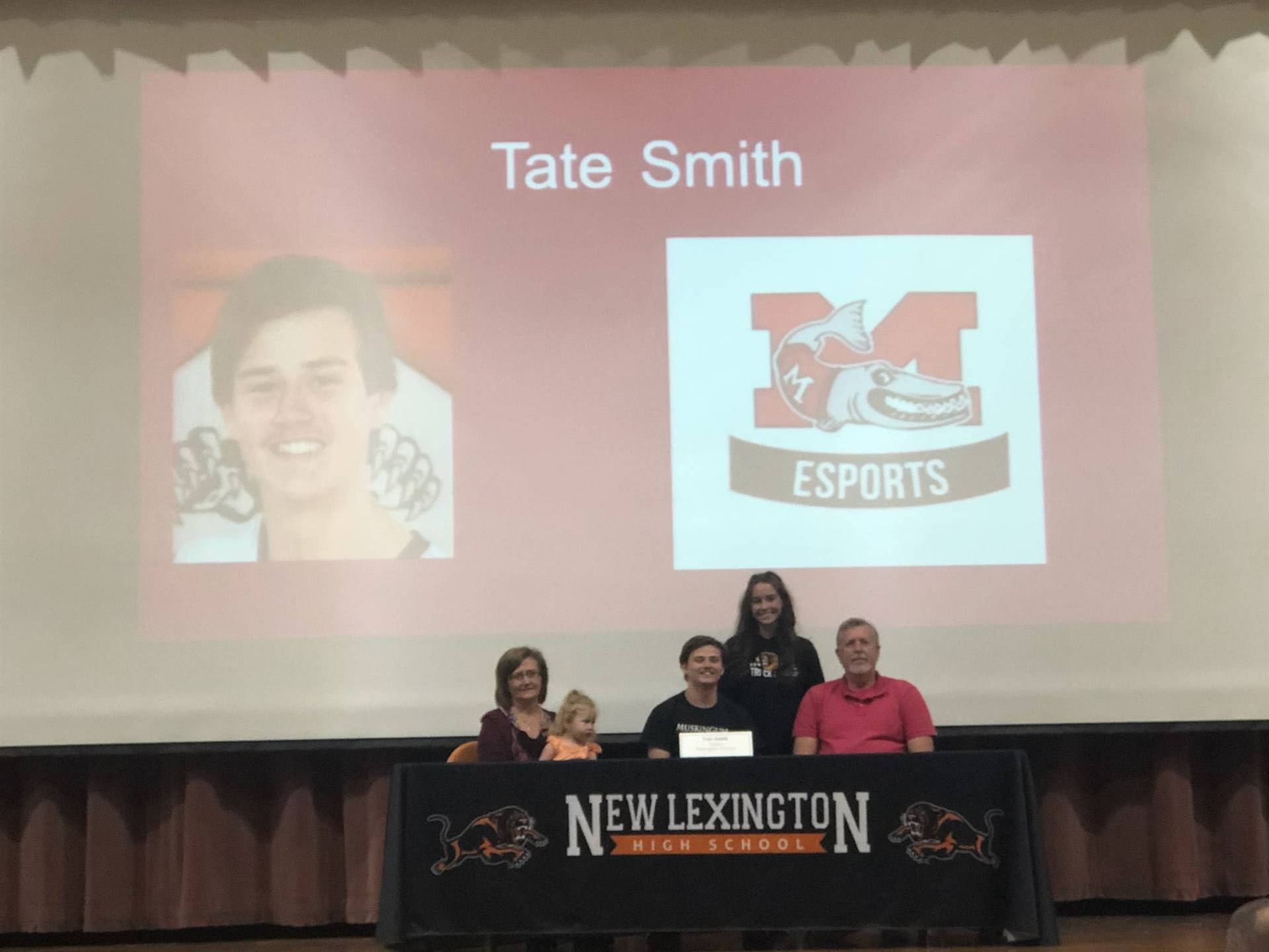 Tate Smith signing his letter of intent to paly eSports for Muskingum University.